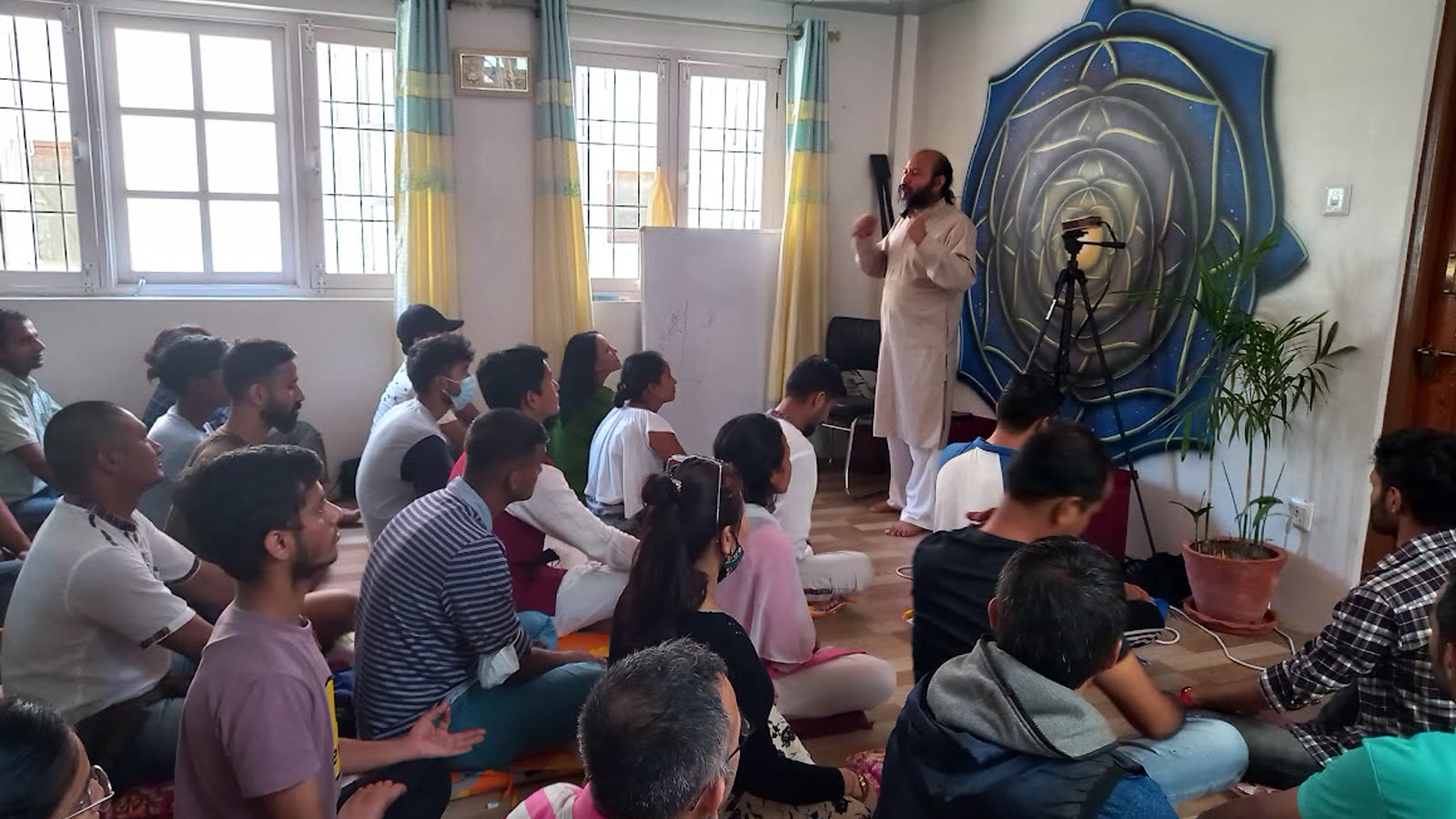 A teacher giving the lesson